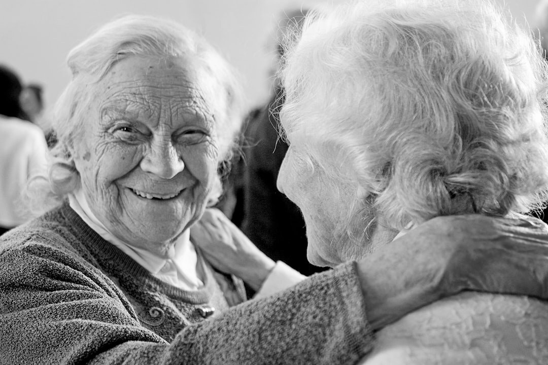 group of elderly friends laughing