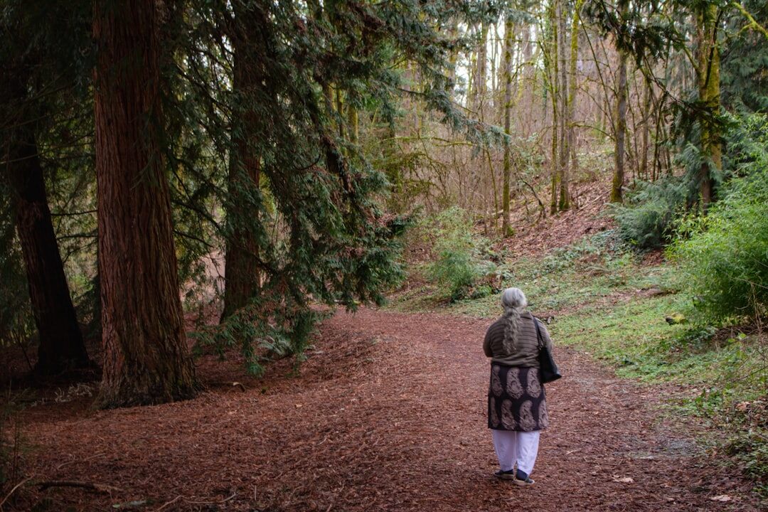 senior woman hiking slowly