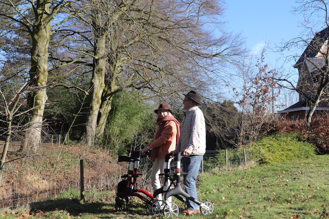 senior couple walking in park
